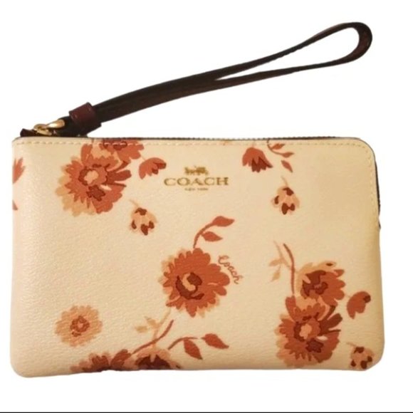 Coach Handbags - NWOT. Coach Leather Floral Wristlet w/ zipper + neutral browns + creams.